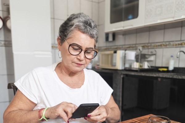 woman checking her diabetes